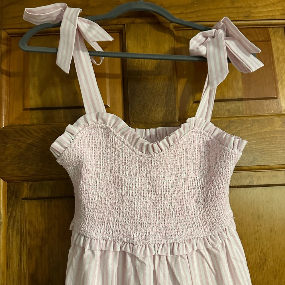 Lizzie striped midi dress with sweetheart neckline and ruffle accents in pink